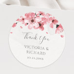Watercolor Floral Pink Cherry Blossom Wedding Classic Round Sticker<br><div class="desc">Express your gratitude to your wedding guests in a charming way with these pink cherry blossom thank you stickers. These self-adhesive stickers feature a beautiful design of pink watercolor cherry blossoms and the message "Thank You" along with the couple's names and wedding date. Perfect for adding a personal touch to...</div>