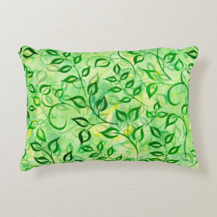 Watercolor green leaves on a yellow-green backgrou decorative cushion