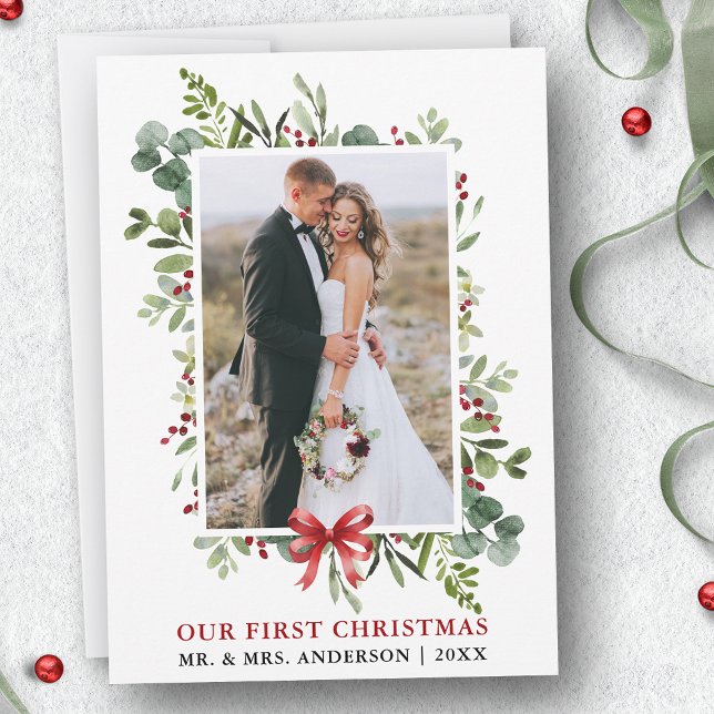 Watercolor Greenery Red Bow First Christmas Holiday Card (Customize to add text to back of card.)