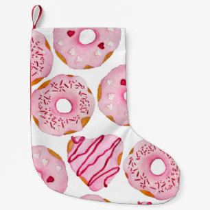 Watercolor hand drawn seamless pattern with pink s small christmas stocking