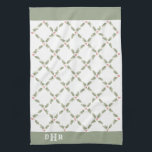 Watercolor Holly Monogrammed Christmas Red Green Tea Towel<br><div class="desc">Add an elegant customised touch to holiday home decorations with a monogrammed Christmas kitchen towel. The intiials on this template are simple to personalise or delete. The design features artistic watercolor holly leaves and berries in green and red on a simple white background. With stylish vintage typography monogram and modern...</div>