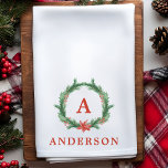 Watercolor Holly Wreath Modern Holiday Christmas Tea Towel<br><div class="desc">Watercolor Holly Wreath Modern Holiday Christmas hand towel. The perfect kitchen decor for the holidays. Personalise this custom design with your own monogram initial and family name.</div>
