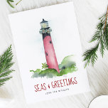 Watercolor Lighthouse Florida Beach Christmas Holiday Card<br><div class="desc">Celebrate Christmas in July 2025 or a warm-weather holiday season with these charming bulk Christmas cards, featuring a hand-painted watercolor of the iconic Jupiter, Florida coastal lighthouse decked in festive garland. Set against a crisp white background, the nautical greeting "Seas and Greetings" is styled in modern berry red brush script,...</div>