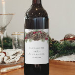 Watercolor Pine Winter Berries Christmas Wedding Wine Label<br><div class="desc">These elegant rustic winter wedding wine labels are the perfect way to personalise your special wine at your wedding reception. The Christmas wedding design features a bouquet of pinecones, pine sprigs and other greenery, and burgundy red holly berries. Find matching products in the collection, or message me through Zazzle Chat...</div>