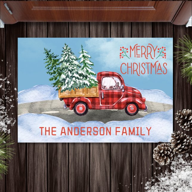 Watercolor Plaid Red Truck Snow Family Christmas Doormat (watercolor merry Christmas doormat with buffalo plaid red truck carrying Christmas trees)