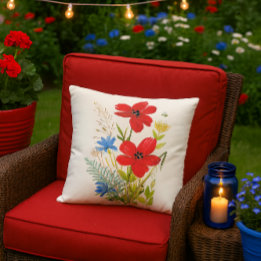 Watercolor Red and Blue Flowers on a White Cushion