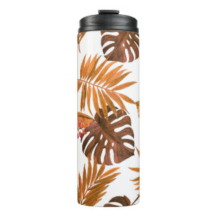 Watercolor seamless pattern with tropical leaves a thermal tumbler