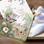 Watercolor Spring Butterfly and Flowers Birthday Card<br><div class="desc">Imagine adding a slice of springtime magic to your gift! Our birthday card is adorned with graceful butterflies and soft spring flowers against a calm green foliage backdrop. It's like giving a burst of nature's beauty. But here's the kicker – the birthday wish is on the back, ready to bring...</div>