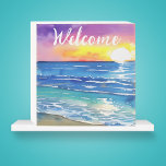 Watercolor Sunset Over the Ocean Welcome  Wooden Box Sign<br><div class="desc">This colourful wooden box sign is perfect for any beach lover or waterfront home. The phrase WELCOME can be changed to your desired phrase or last name using the editing tool.</div>