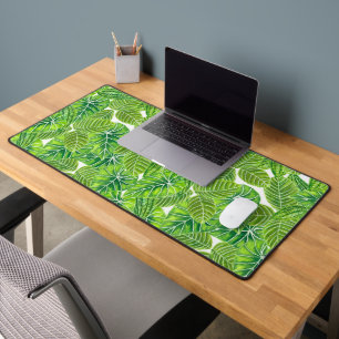 Watercolor tropical leaves pattern design desk mat