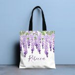 Watercolor Wisteria Personalised Name Tote Bag<br><div class="desc">This design features elegant watercolor wisteria flowers in soft lavender and purple with green leaves on a white background with your name below in stylish purple script. Personalise by editing the text in the text box. Designed for you by Evco Studio www.zazzle.com/store/evcostudio #wedding #batmitzvah #party #gifts #tote #bags #totebags #accessories...</div>