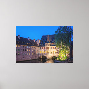 Waterfront building at night in Nuremberg, Germany Canvas Print