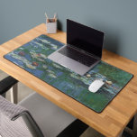 Waterlilies by Claude Monet, Vintage Flowers Desk Mat<br><div class="desc">Waterlilies (1916) by Claude Monet. Water Lilies is a vintage impressionism fine art floral painting. Monet's spring season flower garden in Giverny, France. This landscape is one of many variations of water lily paintings that Monet painted by his pond. About the artist: Claude Monet (1840-1926) was a founder of the...</div>