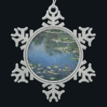 Waterlilies by Claude Monet, Vintage Flowers Snowflake Pewter Christmas Ornament<br><div class="desc">Water Lilies (1906) by Claude Monet is a vintage impressionism fine art landscape floral painting. It is one of many variations of water lily paintings that Monet painted in his flower garden in Giverny, France. Waterlily flowers in a spring season pond. About the artist: Claude Monet (1840-1926) was a founder...</div>