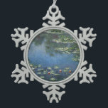 Waterlilies by Claude Monet, Vintage Flowers Snowflake Pewter Christmas Ornament<br><div class="desc">Water Lilies (1906) by Claude Monet is a vintage impressionism fine art landscape floral painting. It is one of many variations of water lily paintings that Monet painted in his flower garden in Giverny, France. Waterlily flowers in a spring season pond. About the artist: Claude Monet (1840-1926) was a founder...</div>
