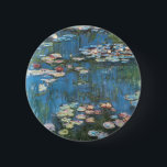 Waterlilies by Claude Monet, Vintage Impressionism 6 Cm Round Badge<br><div class="desc">Waterlilies (1914) by Claude Monet is a vintage impressionist fine art nature painting. One of many variations of water lily floral paintings that Monet painted by the pond in his flower garden in Giverny, France. About the artist: Claude Monet (1840-1926) was a founder of the French impressionist painting movement with...</div>