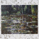 Waterlilies in Pond by Claude Monet, Vintage Art Jigsaw Puzzle<br><div class="desc">Waterlilies by Claude Monet is a vintage impressionism fine art nature painting featuring waterlilies in a pond in Monet's garden at his home in Giverny, France. Willow trees hang over the water and the Japanese footbridge is in the distance. A series of over 250 waterlily flower paintings that Monet painted...</div>