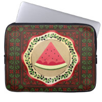 watermelon on olive plate with Palestinian tatreez