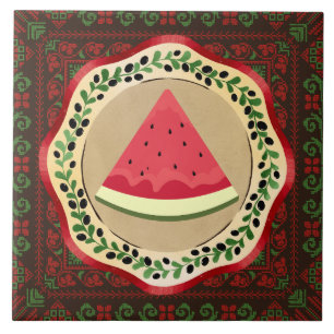 watermelon on olive plate with Palestinian tatreez Tile