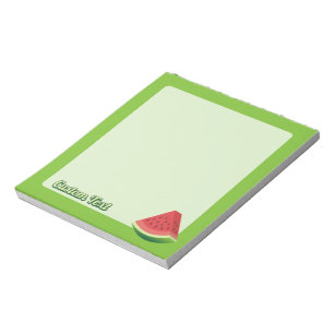 Watermelon slice on light green background notepad