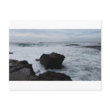 Waves against rocks postcard