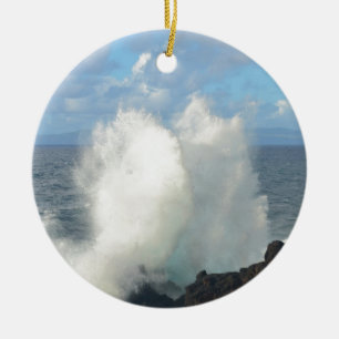 Waves breaking on a volcanic shore ceramic tree decoration