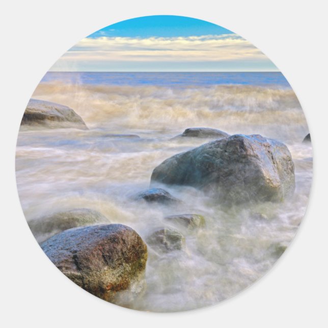 Waves crashing on shoreline rocks classic round sticker (Front)