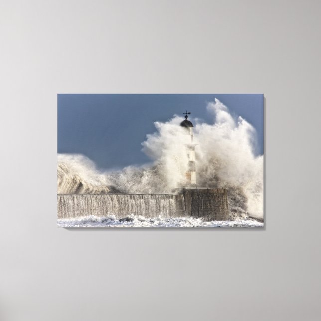 Waves Crashing Up Against A Lighthouse Canvas Print (Front)