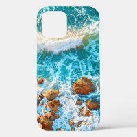 Waves on a rocky beach at sunset. Aerial viewbeach