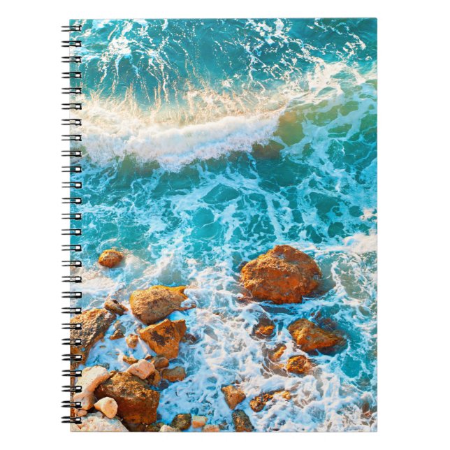 Waves on a rocky beach at sunset. Aerial viewbeach Notebook (Front)