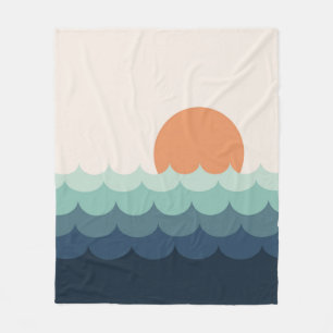 Wavy blue ocean at sunset fleece blanket