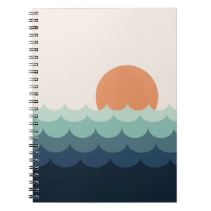 Wavy blue ocean at sunset notebook