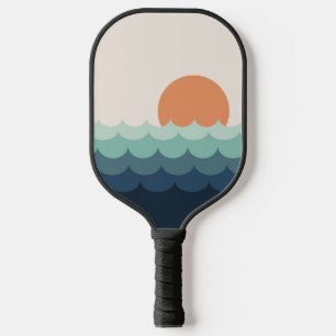 Wavy blue ocean at sunset pickleball paddle