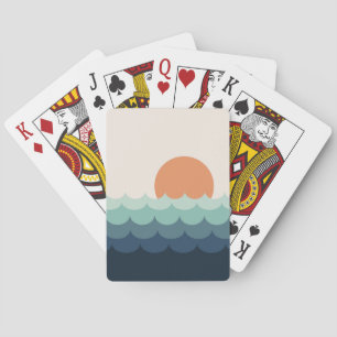 Wavy blue ocean at sunset playing cards