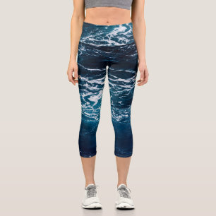 Wavy foamy dark blue sea water capri leggings