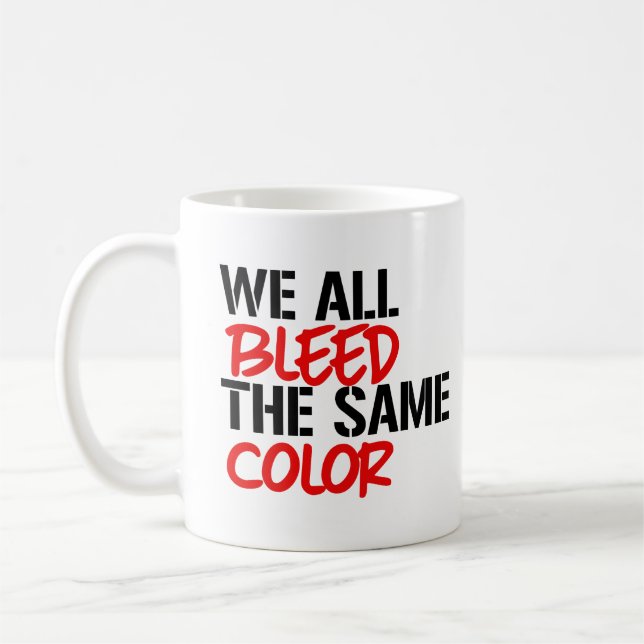 We all bleed the same colour coffee mug (Left)