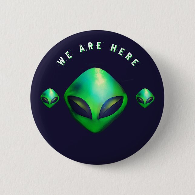 "We Are Here" Green Alien head 6 Cm Round Badge (Front)