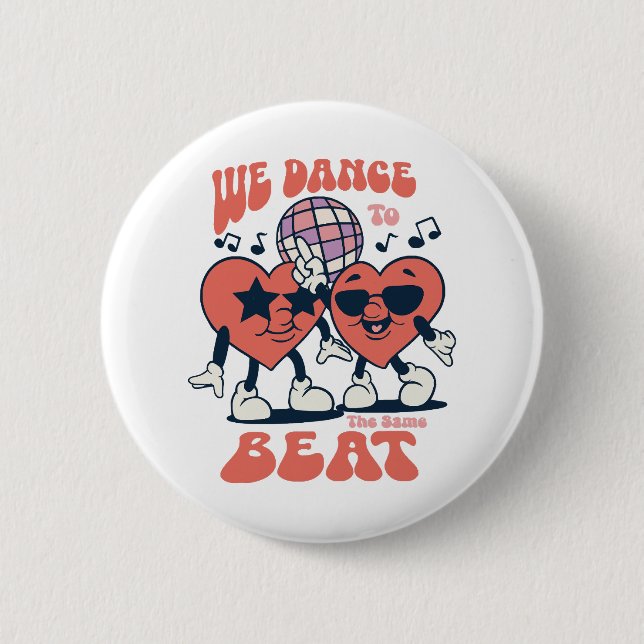 we dance to the same beat 6 cm round badge (Front)