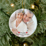 We Love Grandma & Grandpa 2 Photo Christmas Ceramic Tree Decoration<br><div class="desc">Celebrate your grandparents with this beautiful double-sided holiday ornament featuring a front and backside photo and 3 lines of custom text. The words "We Love" are surrounded by 2 red hearts. Perfect for grandma, grandpa, mum, dad or anyone special in your life. Makes a timeless keepsake gift that will be...</div>