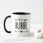 We Love You Bubbe Mug<br><div class="desc">This awesome mug that says, "we love you Bubbe" in modern fonts with a heart accent is perfect for giving to your grandmother on any holiday - Christmas, Hanukkah, Valentine's Day or Mother's Day. She'll love it just like she loves you and will smile and think of you every time...</div>