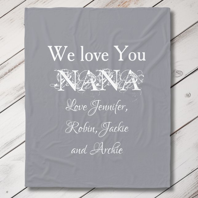 'We Love You Nana' Elegant Script Names White Gray Fleece Blanket ('We Love You Nana' Elegant Personalized Script Names White and Gray Fleece Blanket.)