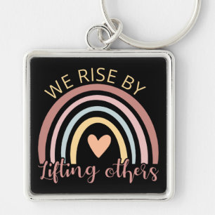 We Rise By Lifting Others II Key Ring