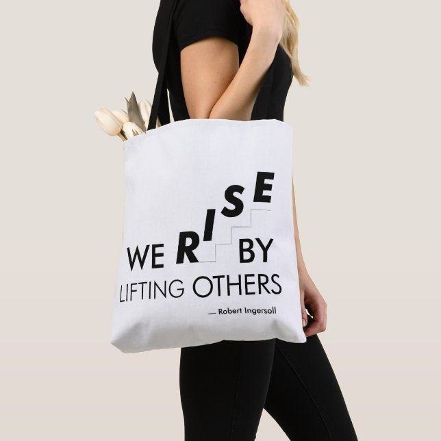 We rise by lifting others tote bag (Close Up)