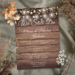 We Still Do Vow Renewal Rustic Wood String Lights Invitation<br><div class="desc">Personalise with your special vow renewal information in chic lettering on a rustic wood background with prety string lights and gold hearts confetti. Designed by Thisisnotme©</div>