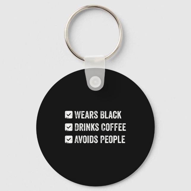 Wears black drinks coffee avoids people  key ring (Front)