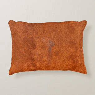 Weathered rusted metal: orange-red texture. decorative cushion