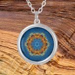 Weave Mandala Blue Yellow and Red Silver Plated Necklace<br><div class="desc">This funky mandala features blue,  yellow,  and red in a basket weave style. Psychedelic visuals for the modern hippie or anyone who loves groovy colours.</div>