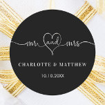 Wedding black white mr mrs heart script  classic round sticker<br><div class="desc">A stylish black background. Mr and Mrs with a heart. Personalise and add your names and wedding date.   White text.</div>