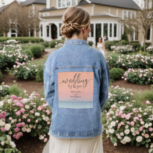 Wedding by the sea under peachy sky sunset denim jacket