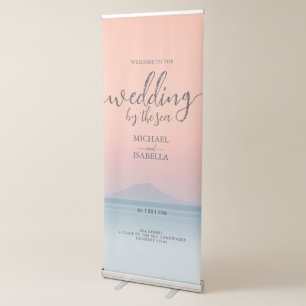 Wedding by the sea under peachy sky sunset retractable banner